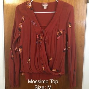 Burnt orange colored top